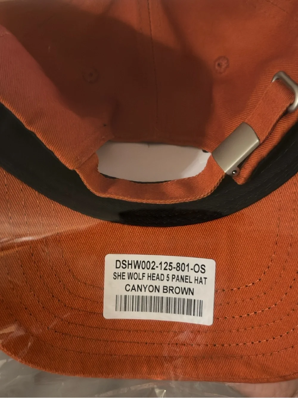 She Darc Sport Orange Cap with White Wolf Emblem
